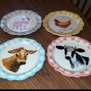 SOLD  Woman Plate Set 4pc luncheon iconic. NWOT no box